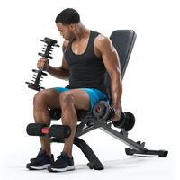 Man using dumbbells on 3.1S Bench.--thumbnail