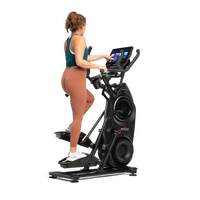 A woman exercising on a BowFlex Max Trainer 40.--thumbnail